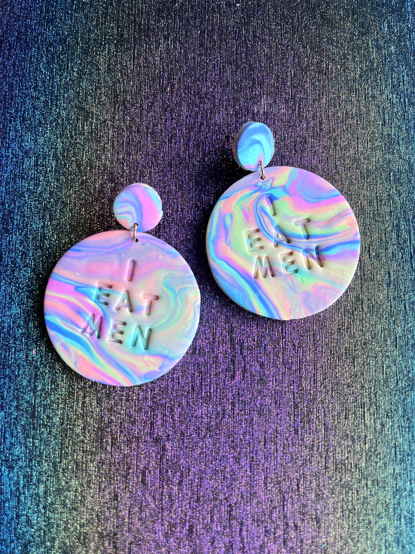 “I eat men” earrings