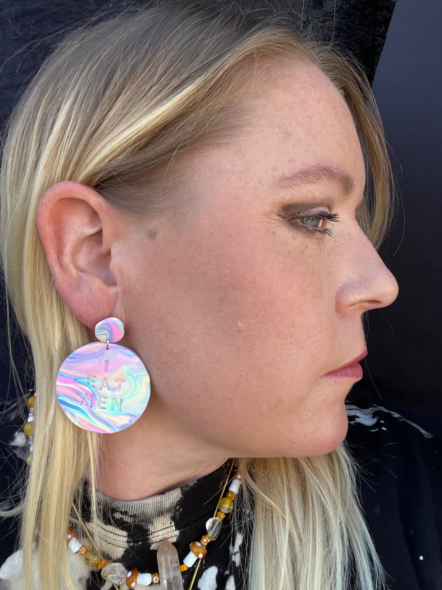 “I eat men” earrings